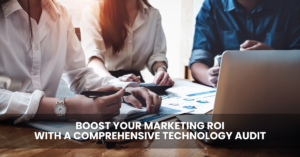Corporate team analyzing documents and using a laptop at a wooden table, with text overlay stating "boost your marketing ROI with AI-driven crisis communications strategies.