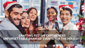 Four people wearing Santa hats smile and clink glasses at a branded holiday event, with a festive decorated tree in the foreground. Text overlay highlights unforgettable festive experiences for your next celebration.
