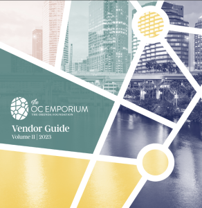Cover of "The OC Emporium Vendor Guide Volume II | 2023," with geometric shapes overlaid on a cityscape background in muted colors.