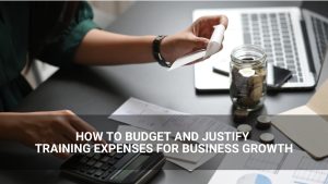 How to Budget Training Expenses and Justify Training Expenses for Business Growth - employee using a calculator to budget - Above Promotions