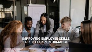 Five people collaborate around a table with documents and a laptop, focusing on enhancing employee skills. Text overlay reads: "Improving Employee Skills for Better Performance.